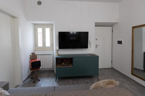 TV a/nebo společenská místnost v ubytování Casa Piccolomini