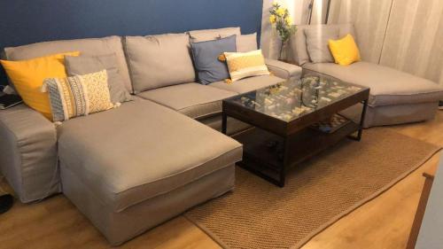 a living room with a couch and a coffee table at Alojamiento rural con encanto in Alborache