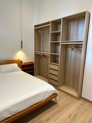 Ένα ή περισσότερα κρεβάτια σε δωμάτιο στο Liberty House Lake Como