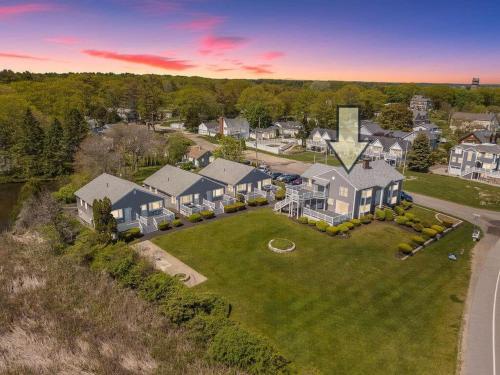 an aerial view of a house with a yard at The Sunrise Deck Ocean Views Private Deck in Rye