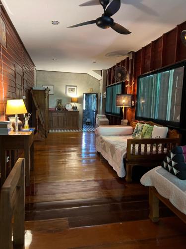 Ένα ή περισσότερα κρεβάτια σε δωμάτιο στο HomeandHomestay Chiang Kham