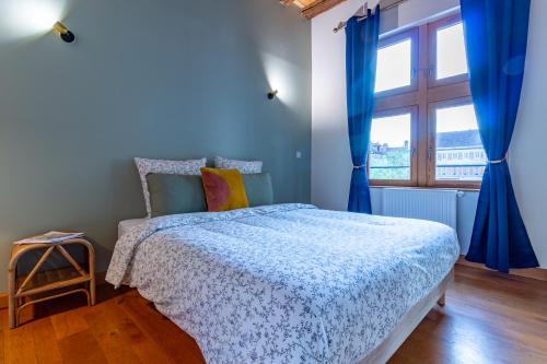 Кровать или кровати в номере Balthazar, Parking gratuit, Vue privilégiée sur la Cathédrale, WiFi HD, Centre-Ville de Troyes