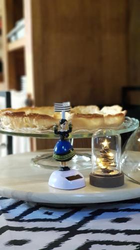 a plate with two trays of food on a table at Domaine La Bonne Etoile in Le Faouët