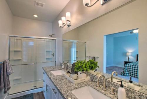 a bathroom with two sinks and a large mirror at Modern Farmhouse Mesa Retreat in Mesa