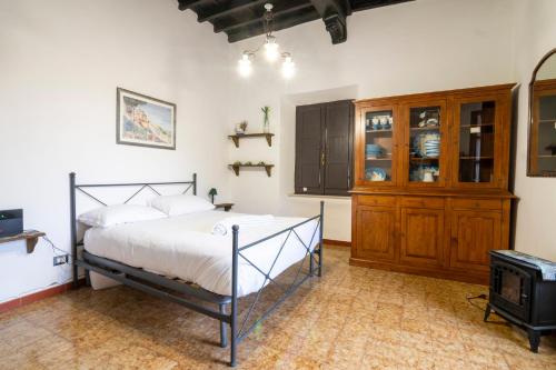 Posteľ alebo postele v izbe v ubytovaní Centralissima Maison di San Francesco, unica e accogliente!