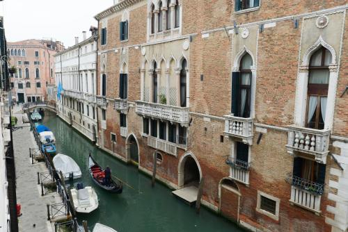 a view of a canal in a city with buildings at San Severo in Venice