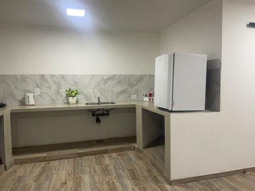 Køkken eller tekøkken på El Tilo Hospedaje