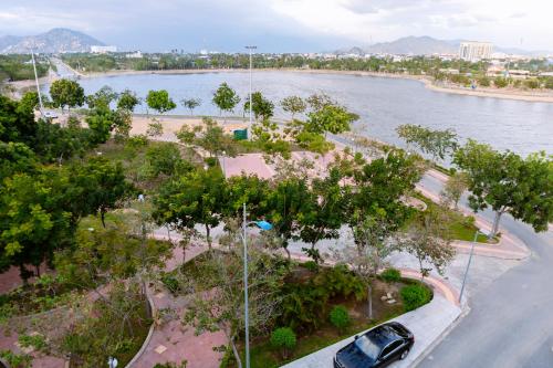 an aerial view of a park next to a river at Khách sạn Ngọc Khanh in Phan Rang