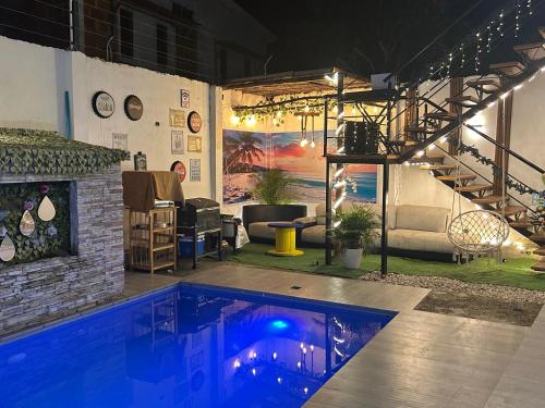 Bazén v ubytování Ola House nebo v jeho okolí