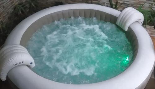 a pool of water in a bucket of water at Villa Dar Lghzal Summer Promo Airport Pick-Up & Private Dining in Heart of Rabat in Rabat
