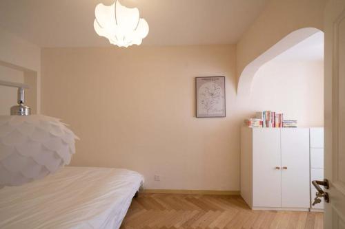 Postel nebo postele na pokoji v ubytování 上海柠檬汁民宿 Shanghai lemon juic B&B -Shanghai Lemon Deluxe Room外滩南京东路步行街
