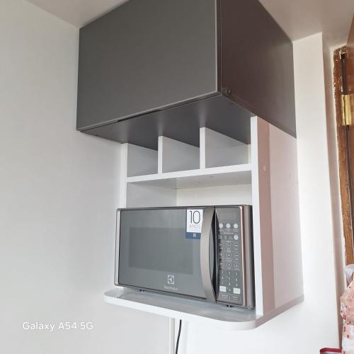 Dapur atau dapur kecil di Departamento Calido y Confortable