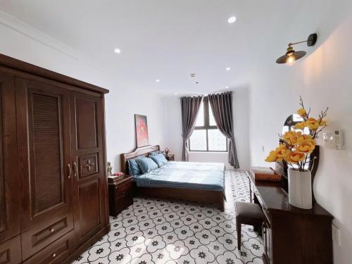 Ένα ή περισσότερα κρεβάτια σε δωμάτιο στο Minh Anh Apartment 2