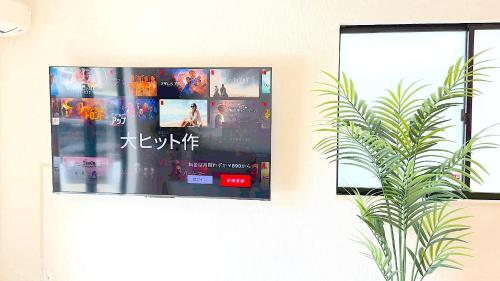 名護市にあるSeaside Yofukeの薄型テレビ