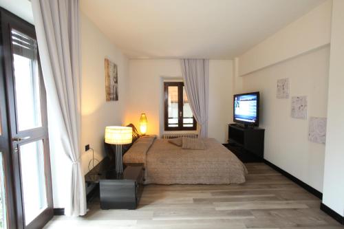 Łóżko lub łóżka w pokoju w obiekcie Il Castello B&B