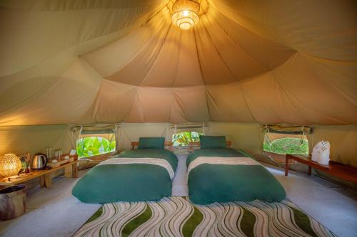 Alamu Eco Lodgeにあるベッド