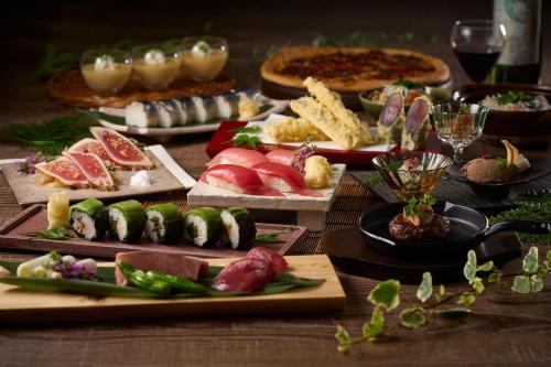 a table topped with lots of different types of food at TAOYA Nachikatsuura in Nachikatsuura