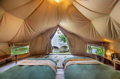 Alamu Eco Lodgeにあるベッド