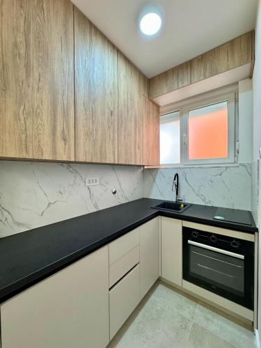 Dapur atau dapur kecil di Apartman 21 Lux
