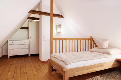 Postel nebo postele na pokoji v ubytování Lexsimihof - Stöckl