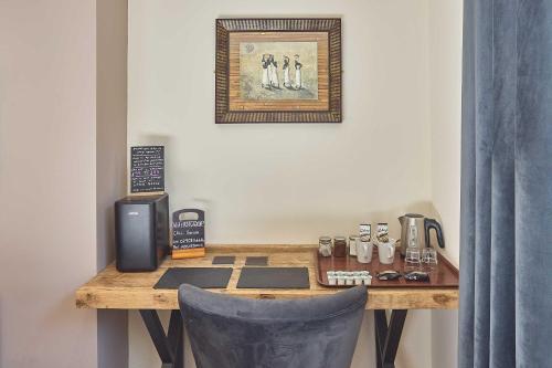 a wooden desk with a speaker at Aaron Accommodation in Whitby