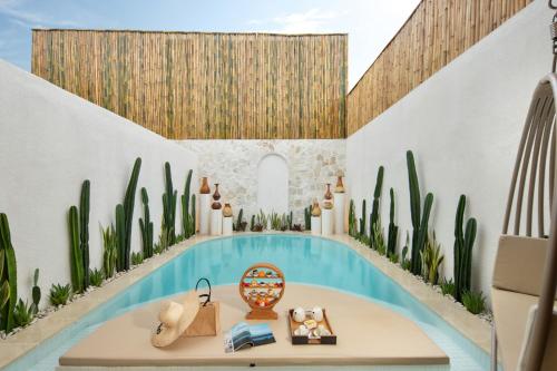 a rendering of a villa with a swimming pool at The Arden Villa Uluwatu by Ini Vie Hospitality in Uluwatu