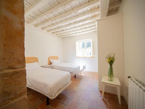 Postel nebo postele na pokoji v ubytování Casa Tía Raquel, en Ruiloba, Comillas