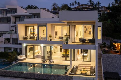 an aerial view of a house with a pool at 4 Bed Sea View Villa with Breakfast - KBR32 in Ban Bang Po