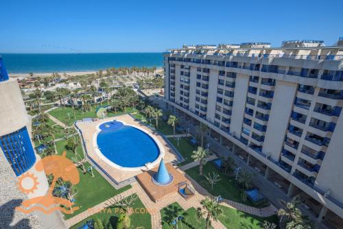 an aerial view of a hotel and the beach at Patacona Resort Apartments Primera Linea in Valencia