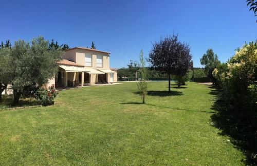 Photo de la galerie de l'établissement Spacieuse villa avec piscine et grand jardin, à Montarnaud