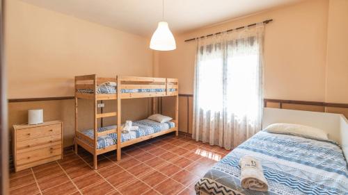 En eller flere senge i et værelse på Bellavista Arriate by Ruralidays