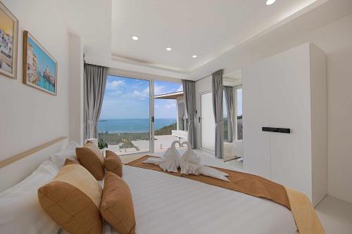 Katil atau katil-katil dalam bilik di Villa The Wave