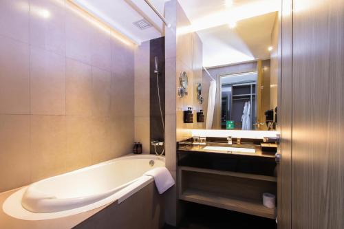 Koupelna v ubytování FUGO Hotel Banjarmasin