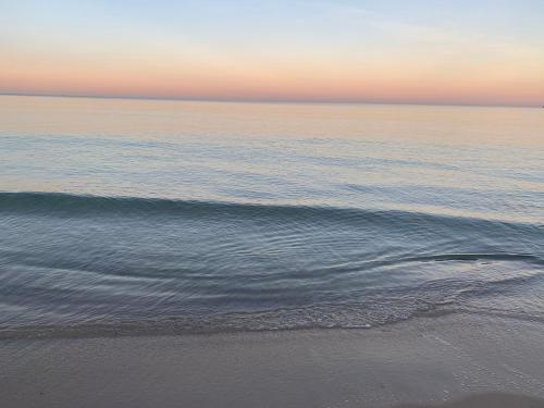 a view of the ocean from the beach at Belle résidence in Hammam Sousse