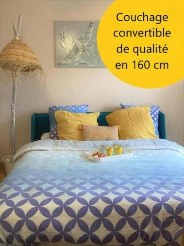 Katil atau katil-katil dalam bilik di MES VACANCES A LA MER studio 4 pers, parking privé, wifi, linges fournis, climatisation