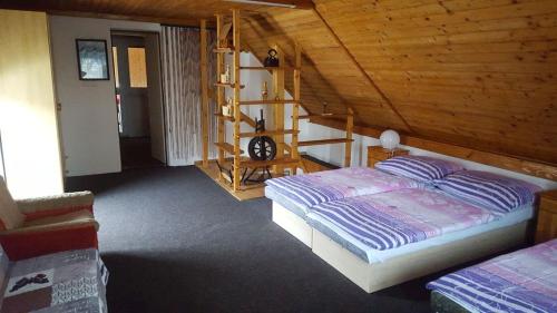 Postel nebo postele na pokoji v ubytování Chata Marta