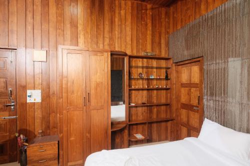 Letto o letti in una camera di Rainforest Resort