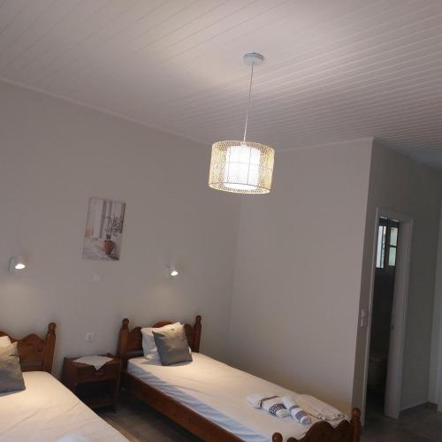 Cama o camas de una habitación en E & K Sea View Apartments Urlaub mit Ausblick Entspannung direkt am Meer