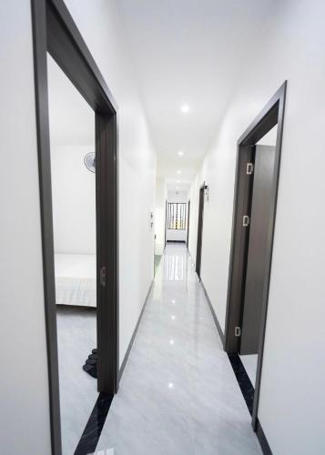 Postel nebo postele na pokoji v ubytování Hoàng Anh Hotel