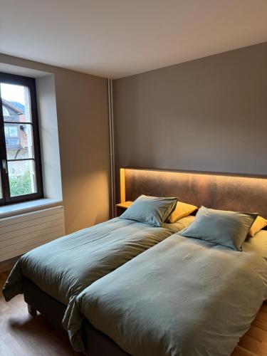 Ένα ή περισσότερα κρεβάτια σε δωμάτιο στο Auberge de l'Étoile