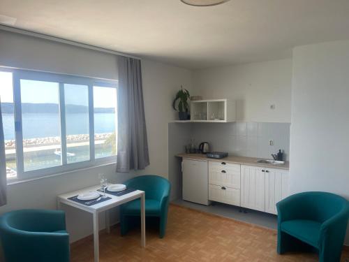 Kuchyň nebo kuchyňský kout v ubytování Apartmány Júlia