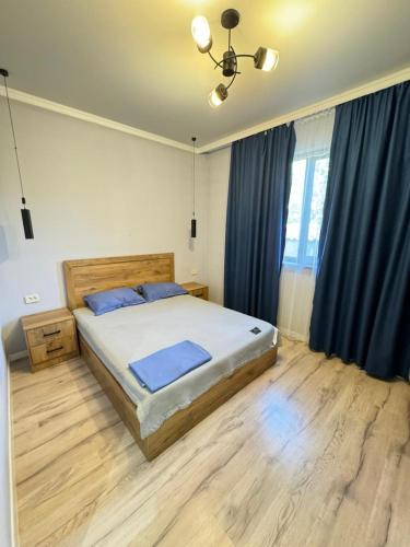 Voodi või voodid majutusasutuse Rich Home toas