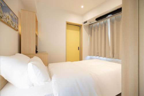 Cama o camas de una habitación en Hotel Marguerite Seoul