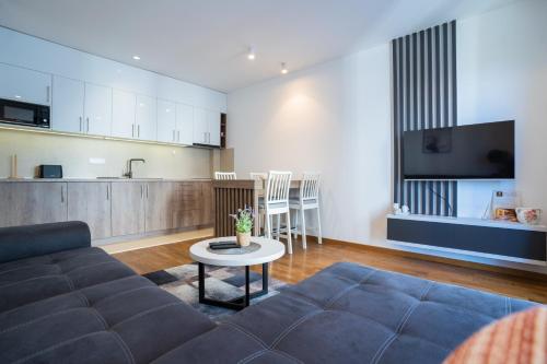 Una cocina o zona de cocina en Apart kompleks Binis