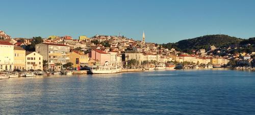 a city with boats docked in a body of water at Sea view BluEscape by Vellaris, Luxury Mobile Home in Mali Lošinj