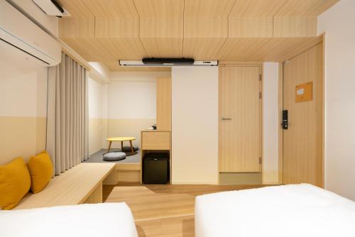 Cama o camas de una habitación en Hotel Marguerite Seoul