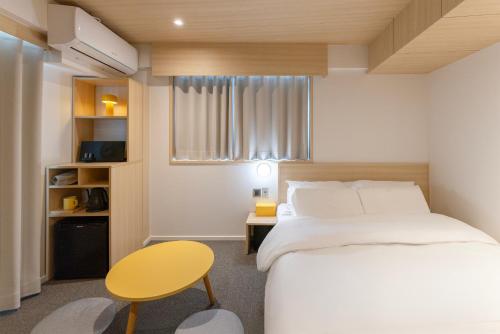 Cama o camas de una habitación en Hotel Marguerite Seoul