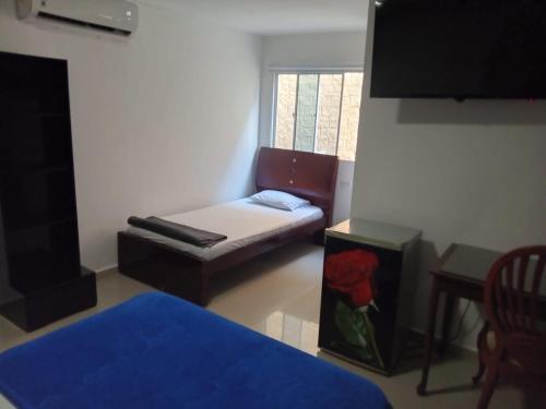 Postel nebo postele na pokoji v ubytování Hotel Intersuites