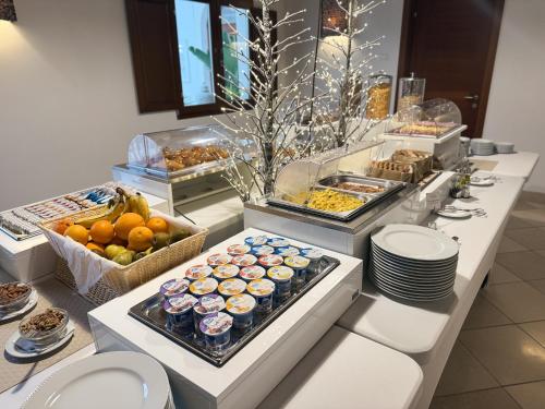 a buffet line with many different types of food at Palazzo Sant'Elena in Foggia