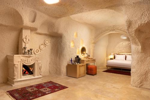 Letto o letti in una camera di Zafora Cave Suites Hotel Cappadocia